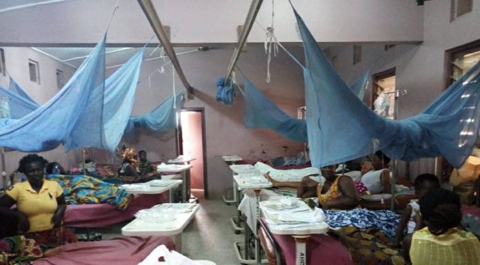 Patients sleep on floor, benches to receive treatment at Asuofua Health Center