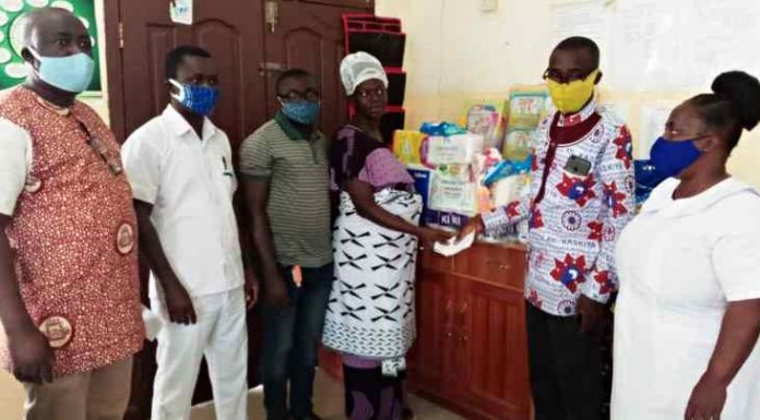 NPP Youth in Bibiani Donates to Woman Who Birthed Quadruplets